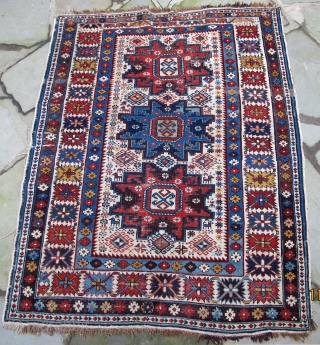 Finely woven Daghestan, Caucasus, original selvedges, original kelim end finishes with knotted warps, plethora of natural dyes including a wonderful maroon,19th. century, 56" X 45"[143 X 114cm]      