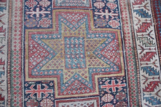 Rug store

Category:Antique
Origin:Caucasian	
City/Village:Caucasia
Size cm:110 x 275
Size ft:3'8'' x 9'2''
Code No:R591

This rug is over hundred years old and very good condition just need little bit repair         