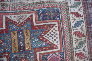 Rug store

Category:Antique
Origin:Caucasian	
City/Village:Caucasia
Size cm:110 x 275
Size ft:3'8'' x 9'2''
Code No:R591

This rug is over hundred years old and very good condition just need little bit repair         