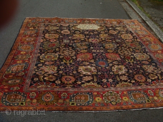 A very boldly executed Sultanabad/Arak area "vase design" carpet with a very legible inscription cartouche and dated 1305 Hijri = 1878 A.D. Approximately 9'6" X 10" with mostly medium to low pile  ...