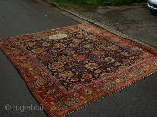 A very boldly executed Sultanabad/Arak area "vase design" carpet with a very legible inscription cartouche and dated 1305 Hijri = 1878 A.D. Approximately 9'6" X 10" with mostly medium to low pile  ...