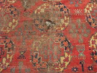 An un-useable Ersari rug. The end kilims are not original and were sewn to the rug at a much later date. Size doesn't matter!         