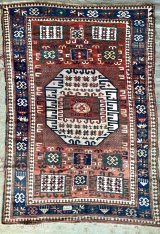 KAZAK Karachopa rug, dated 
94” x 63” 
Condition: small repairs, no holes or tears.                   