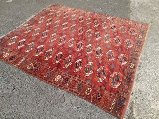 An antique Tekke main carpet  . 220/200 cm. Very old and Fine. Some repairs. Original size.                