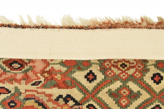 The Kurds of Senna produce kilim of very sophisticated construction. Their rugs have easily identifying characteristics : fields of repeating floral pattern, cotton warps and wool weft, very fine slitweave with extra  ...