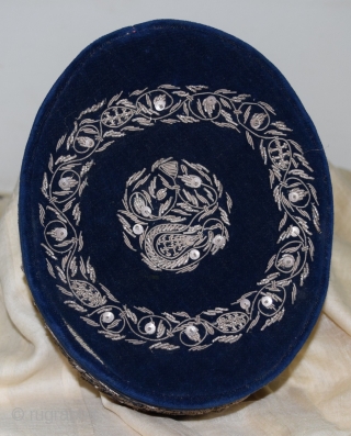 A very fine cap or Topi for men. Silver threat work from Rajasthan on velvet. Size: 19 cms X 14,5 cms. 1920s. SOLD.          