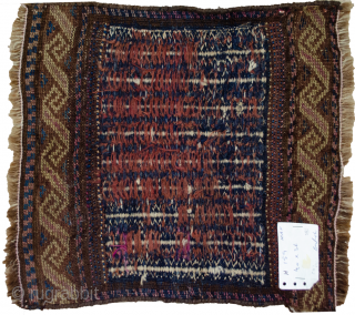 Fascinating antique Kelat bagface from Northeast of Iran.  This is a double technique weave with a very fine flat weave in the centre and piled technique on either end. There are  ...