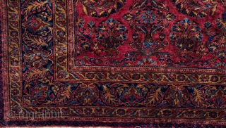 It is rare to find Lilihan carpets in such a big size. The deep red ground is decorated with an all-over bush design and a floral dark blue border. The colours are  ...