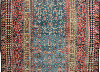 This is a most unusual 19th-century Farahan rug, 290x140cm, with a Turkish design. As shown in the image, there is a repair, and the selvedges are rebound. It is evenly worn, which  ...