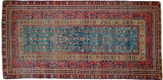 This is a most unusual 19th-century Farahan rug, 290x140cm, with a Turkish design. As shown in the image, there is a repair, and the selvedges are rebound. It is evenly worn, which  ...