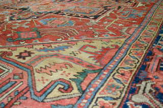 Antique Bakhshayesh Carpet 380x294cm, late 19th Century. Minor repairs are expertly done. The rich red ground colour contains a large red medallion. The motifs around the medallion have unusual features like the  ...