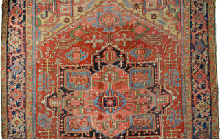 Antique Bakhshayesh Carpet 380x294cm, late 19th Century. Minor repairs are expertly done. The rich red ground colour contains a large red medallion. The motifs around the medallion have unusual features like the  ...