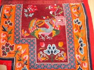 
  Very  fine  and  lovely Tibetan  saddle rug  round  1920 , 134 X 67 cm.

  Quality wool , Excellent  condition .   