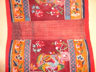 
  Very  fine  and  lovely Tibetan  saddle rug  round  1920 , 134 X 67 cm.

  Quality wool , Excellent  condition .   