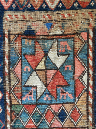 Caucasian runner, possibly a Gendje?, 19th.c. Much worn in the field and corroded brown but nicely composed with great abrashed colors on the outer "snake" border.
270 x 115 cm    