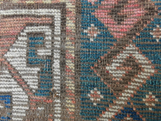 Caucasian runner, possibly a Gendje?, 19th.c. Much worn in the field and corroded brown but nicely composed with great abrashed colors on the outer "snake" border.
270 x 115 cm    