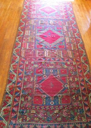 Full color spectrum, 1800s dated Moroccan Palace rug. Possibly unique. I could not find anything like it in the literature and would appreciate feedback from viewers. It measures 15'6" x 6'3.  