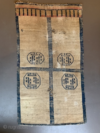 Door rug from Tibet. With some old repairs and holes.  Basically in a weak condition as you can see from the pictures. But it is the rare and early type of  ...