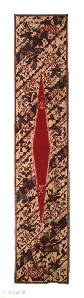 Breast cloth - kemben, Banyumas, Java, Indonesia. Material:Cotton, Technique:Batik Tulis. Size: 260x52. Circa, 1940.
A fine example of banyumas batik, decorated with diagonal floralistic pattern, birds at each end, red lozenge. Many more  ...