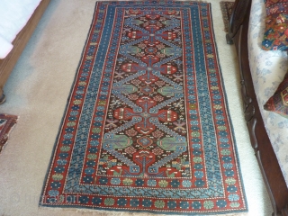 Antique Seichur in almost perfect condition.  Minimal oxidation of the brown. Wool on wool. 7'2" x 4'3"               