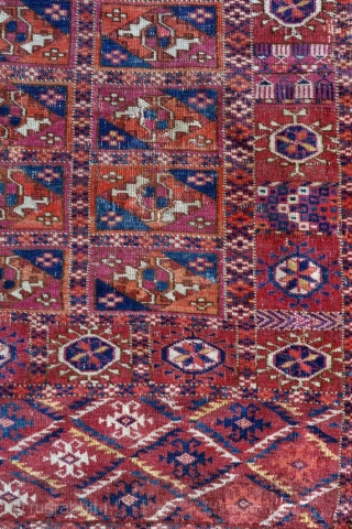 Late 19th century small tekke turkmen rug, possibly a dowry trapping. Great colours – evenly low pile with several small areas of crude repairs and a larger section in the upper selvedge  ...