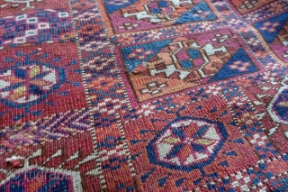 Late 19th century small tekke turkmen rug, possibly a dowry trapping. Great colours – evenly low pile with several small areas of crude repairs and a larger section in the upper selvedge  ...