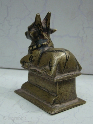 Brass Nandi Statue The 'vahana' or carrier of Shiva, 
The Nandi Bull is always to be found facing the 'shivalingam' in places of worship. Nandi represents the creative energies of the restless  ...