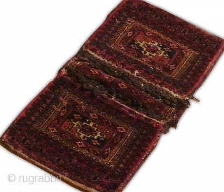 A glorious small antique tekke 'khorjin' or saddle bag.
Turkeman, central asia.
Age: circa 1890.
Materials: wool on wool foundation.
Condition: excellent. 
Design: Tekke major and minor guls.
Colours & weave: natural dyes. fine, tight weave.
52x27cm  