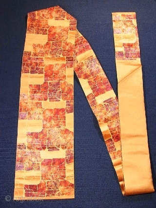 ‘Stone pavement’ silk Obi, Japan, Showa (circa 1940), cm 341x31. The ‘obi’ is a sash for traditional Japanese dresses, and a part of kimono outfits. This one is a so-called ‘nagoya obi’,  ...