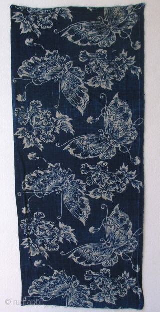 Katazome panel, Japan, early Meiji (circa 1870), cm75x33. This is a  Katazome  a cloth with a repeated pattern of butterfly and peony motif on a  sky blue indigo ground.  ...