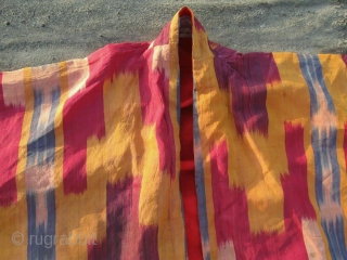 Antique Uzbek silk Ikat coat. In very good condition, without damaged area, holes.                    