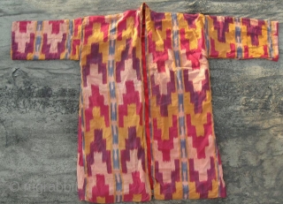 Antique Uzbek silk Ikat coat. In very good condition, without damaged area, holes.                    