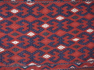 Turkmenistan Yomud Kilim Torba extra weft weave, original condition with side tassles and braids. Plain ivory kilim backing. Size : 33" X 14" - 84 cm X 36 cm without tassles   ...