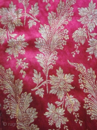 Fushia and gold brocaded satin silk Bindalli from Ottoman Empire late 19c early 20c. Usually used for ceremonial event . Beautiful brocaded fuchsia satin with gold thread and floral garlands, entirely piped  ...