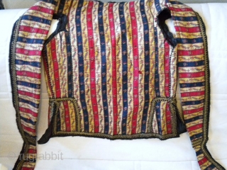 Ottoman man's jacket in very thin and early kashmir kani weave.Circa 1800/1850

Made in India for the Turkish market. Long sleeves fall back on the shoulders or back. This coat is fully trimmed  ...