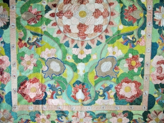 ​Chinese for export to Portugal
Silver and polychrome silk floss embroidered hanging in the Chinese manner. A large central peony is framed by pairs of birds, lotus flowers, clouds and phoenix, all derived  ...