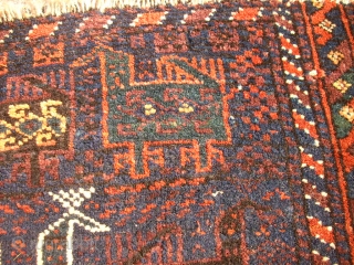 Very old Baluch bird bag face. Size: 65 x 60 cm. Soft and shiny wool. One end (border) miss.              