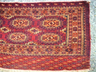 old turkmen torba. Size: 75 x 149 cm. Two edge at the top are dameged. Full pile.                