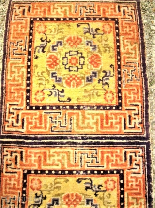 antique Tibet / Chinese sitting-meditation rug. Size: 61 x 183 cm. Some low pile.                   