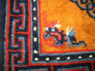 Pair of Tibetan / Chinese rugs. Size: 66 x 60 cm and 66 x 61 cm.                 