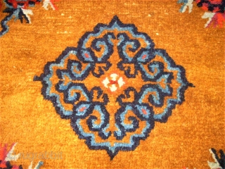 Pair of Tibetan / Chinese rugs. Size: 66 x 60 cm and 66 x 61 cm.                 