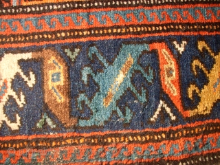 SOLD - THANK YOU! Antik, persian kurdish? rug. very nice colours and interesting ornaments. fine knotting. pile is low. 
Size: 180x110cm            