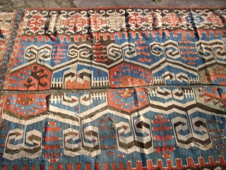 Antique anatolien Kelim! Size: 209 x 155 cm (Both). Used. Holes and repairs. 
I think it was used as a curtain.            