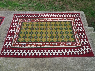 An interesting Pirot sarkoy kilim  with  kostenica  motif in the borders, measuring about 1.5x2m                