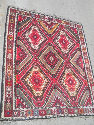 Big, old Sarkoy Pirot kilim, measuring 405 to 330cm, with damage on one side. 

                  