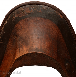 Tibetan wooden saddle with shagreen (the skin from a shark or stingray) decorating the front and back ‘faces’ and lower flat surfaces at either end. The rich grained wood has a beautiful  ...