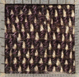 Uncommon thickly padded four paneled Tibetan masho - or above-saddle carpet - woven in the tsuktruk style. The naturally dyed pile is actually a deep purple, obtained from aubergine. The face has  ...