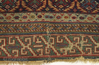 Early east caucasian rug in distressed condition. Lovely green border and a nicely drawn colorful lattice with a large variety of delicate inset elements. Rug is cut and crudely resewn lenghtwise. A  ...