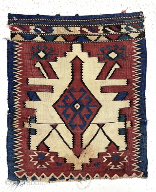 Antique unusual flat woven bagface with a design typically found on large kuba kelims.  This kelim bagface has original selvages and end closure loops on top. Unraveling at bottom. As found,  ...