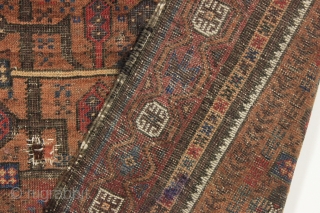 Antique baluch prayer rug. Interesting older example of an unusual design group. Wide range of all natural colors with very nice greens and blues. Areas of wear and with a small patch  ...